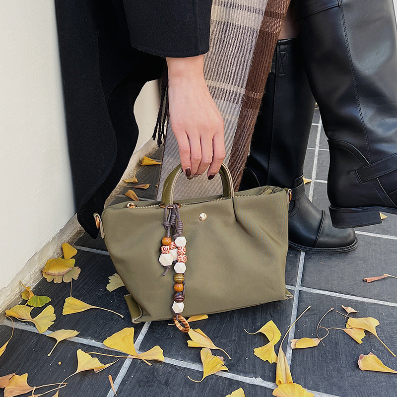 Damen elegante Umhängetasche mit charmantem Dekor Nord Taschen