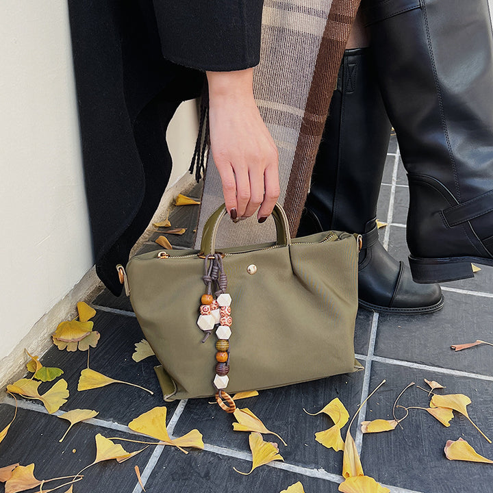 Damen elegante Umhängetasche mit charmantem Dekor Nord Taschen