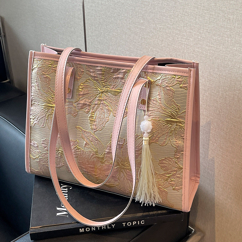 Damen Tragetasche mit floralem Stickdesign und elegantem Quastenanhänger Nord Taschen