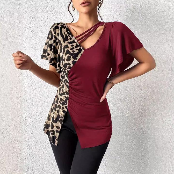 Damen Designermode Oberteil mit asymmetrischem Schnitt und Leopardenmuster