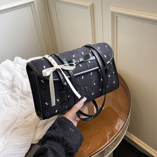 Damen Umhängetasche mit floralem Relief und elegantem Schleifenakzent Nord Taschen