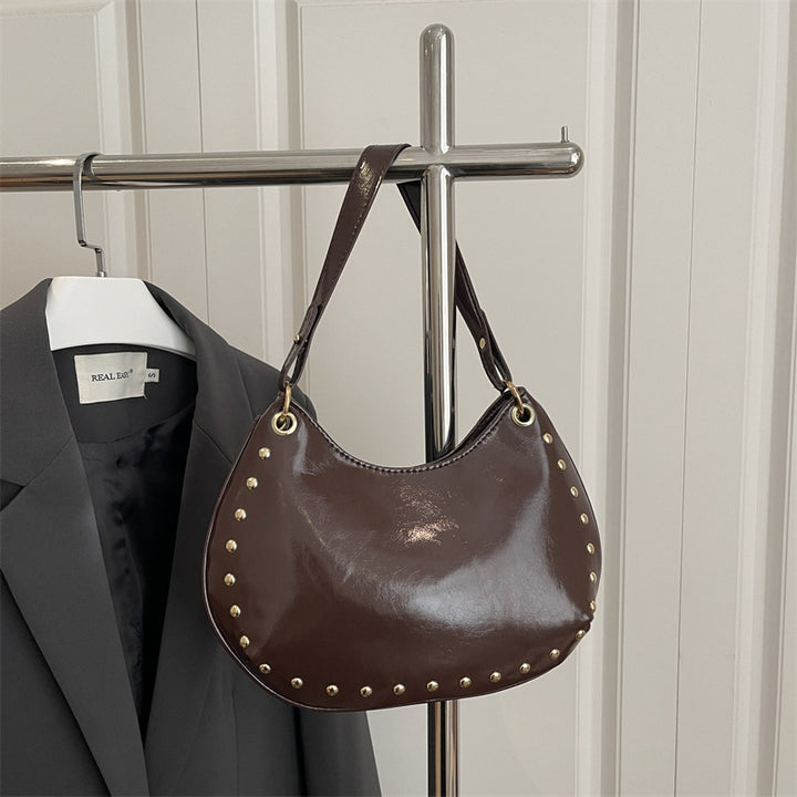 Damen elegante Schultertasche mit goldenen Nieten Nord Taschen