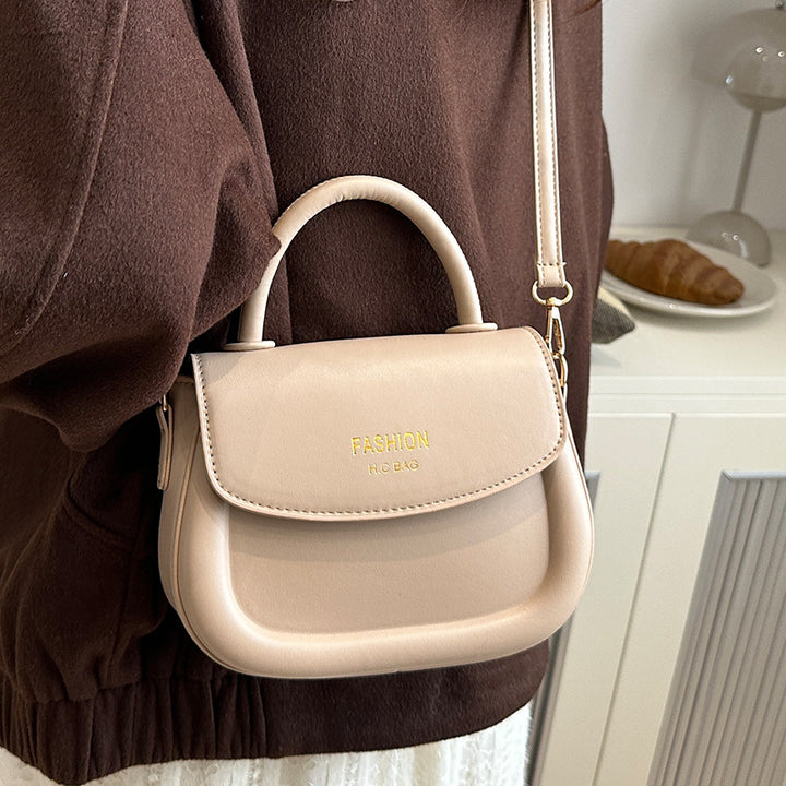 Damen Henkeltasche mit modernem Klappverschluss und eleganten Details Nord Taschen