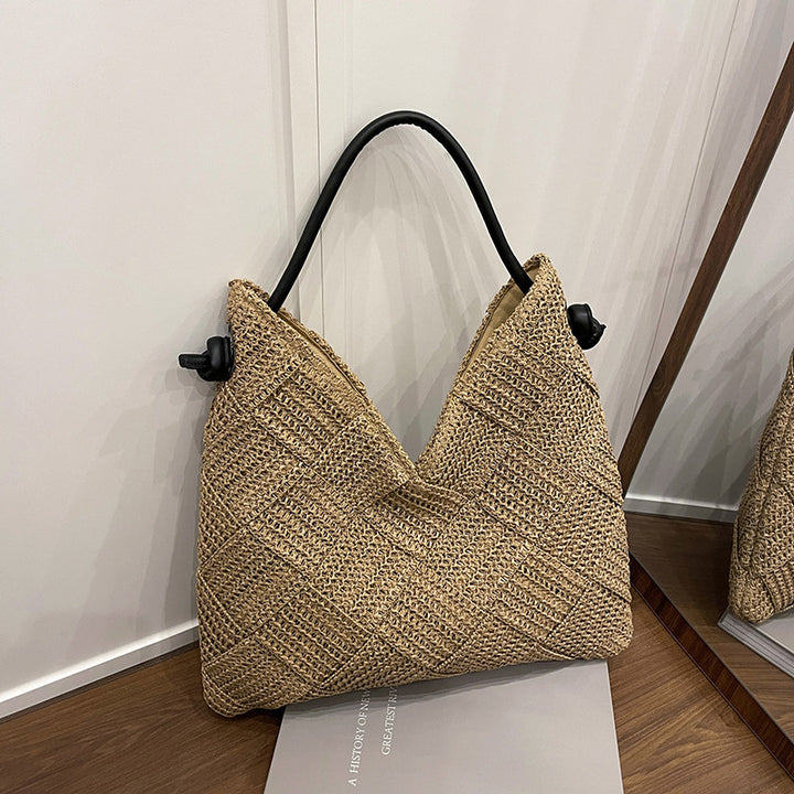 Damen Beuteltasche aus geflochtenem Materialien mit minimalistischen Akzenten Nord Taschen