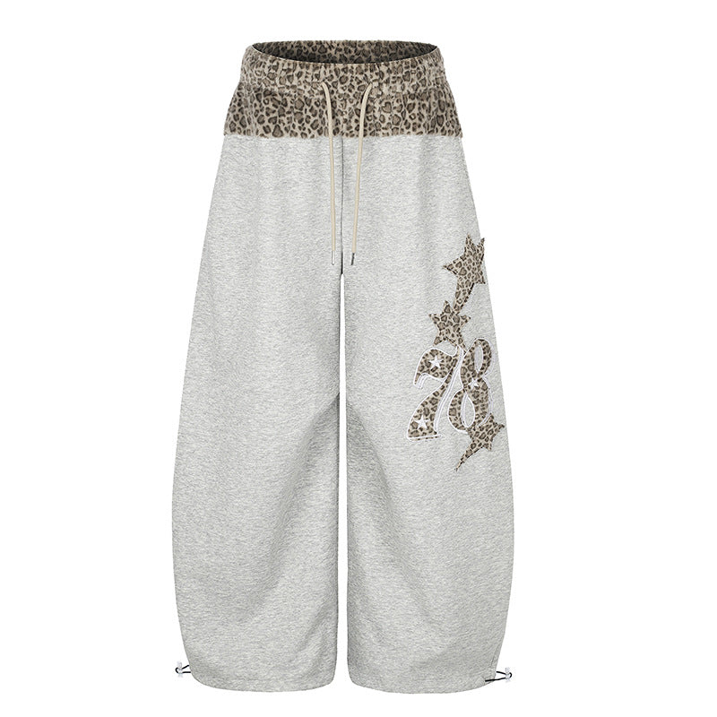 Damen Extraweite Palazzo-Loungehose mit hohem Komfortbund, Leoprint-Bund und dekorativer Stern-Ziffer-Applikation Nord Taschen