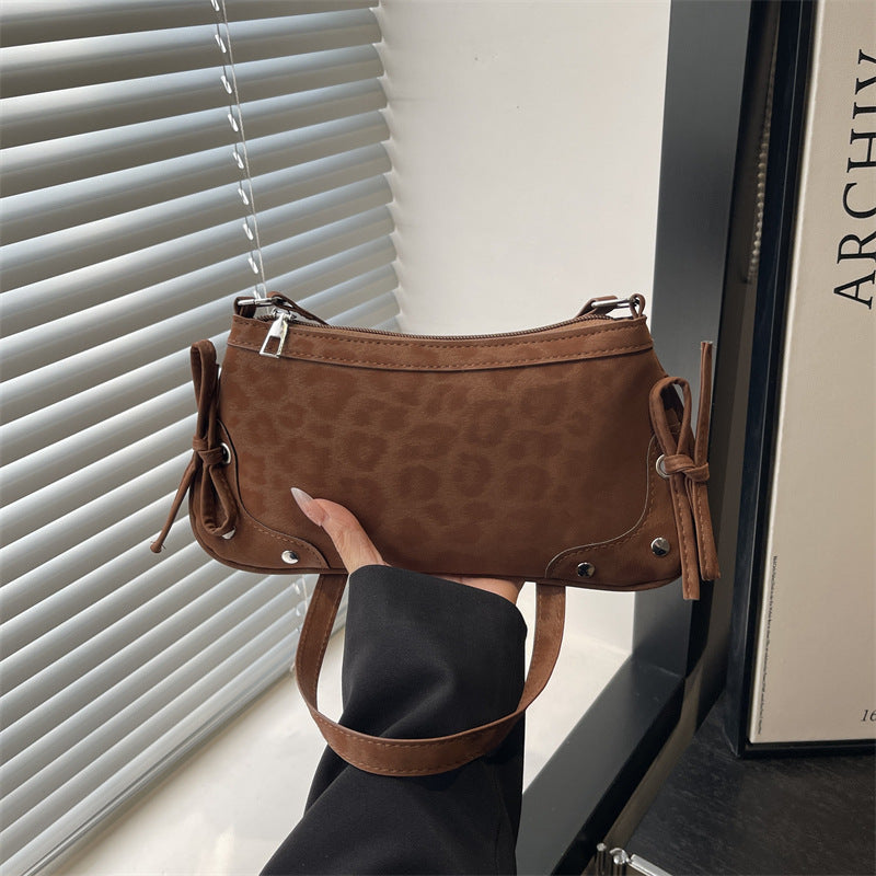 Damen Umhängetasche mit Leopardenmuster und dekorativen Schleifendetails Nord Taschen