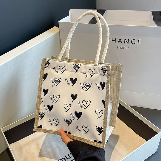 Damen Jute-Tragetasche mit verspieltem Herzdesign und Buttonverschluss Nord Taschen