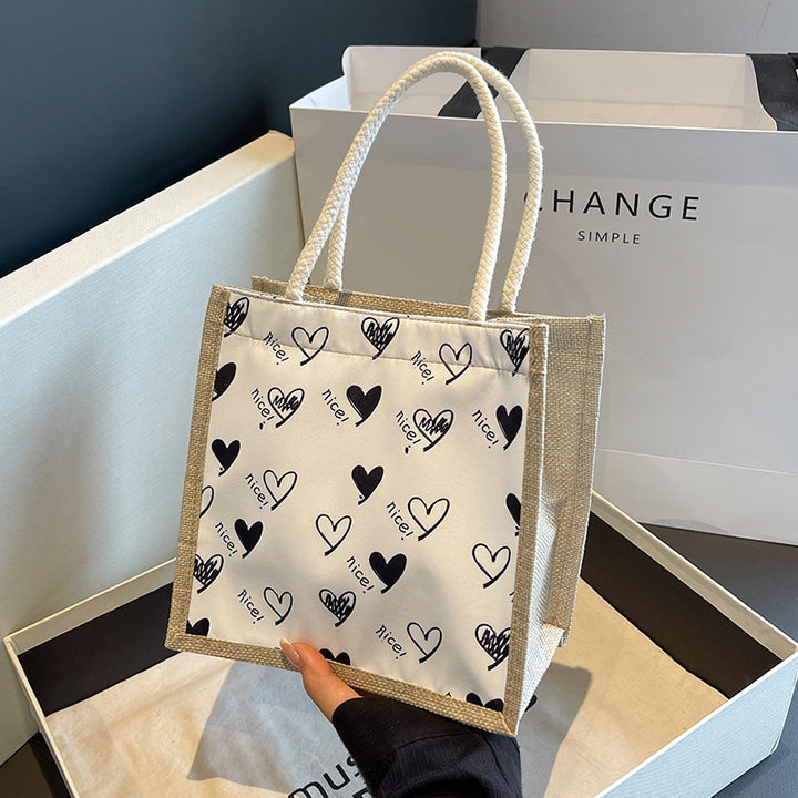 Damen Jute-Tragetasche mit verspieltem Herzdesign und Buttonverschluss Nord Taschen