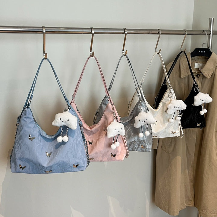 Damen modische Hobo-Tasche mit verspieltem Anhänger und detailreicher Verzierung Nord Taschen