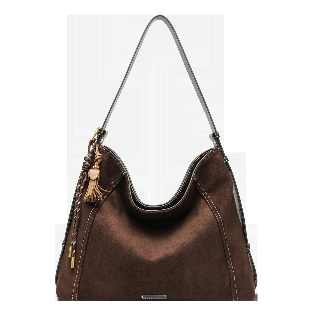 Damen Hobo Tasche mit elegantem Leder und dekorativen Quasten Nord Taschen