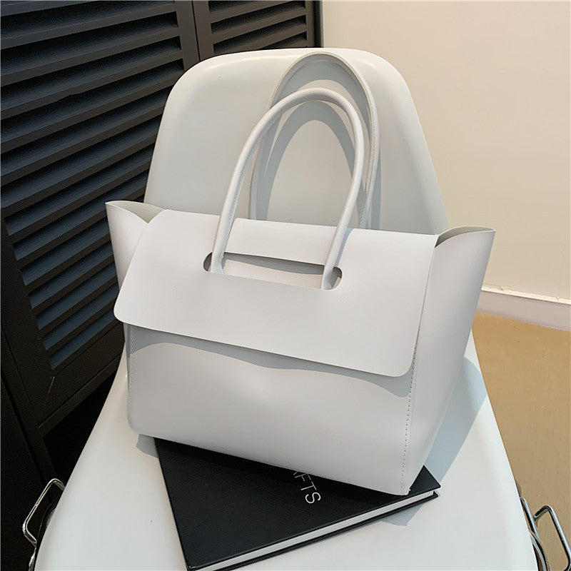 Damen Designer Handtasche mit modernem Klappverschluss Nord Taschen