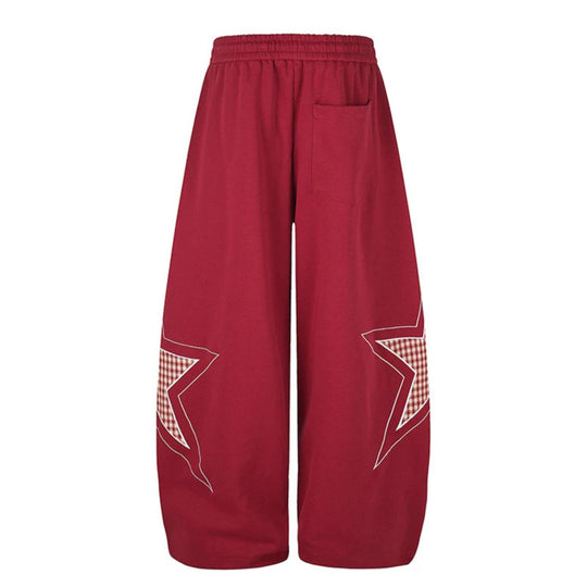 Damen weite Palazzo-Sweathose mit Stern-Applikationen und Karo‑Einsätzen Nord Taschen