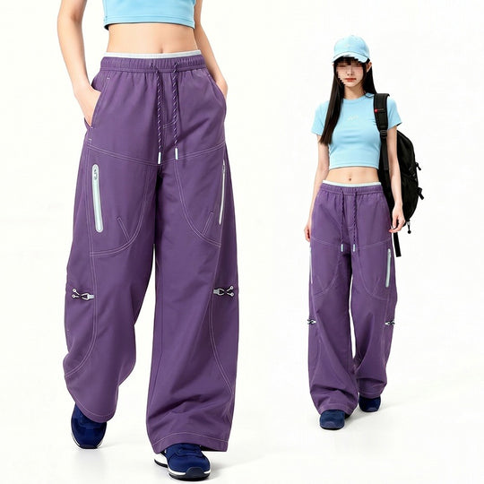Damen Oversize Tech-Loungehose mit Kontrastnähten, reflektierenden Reißverschlusstaschen & Kordelbund Nord Taschen