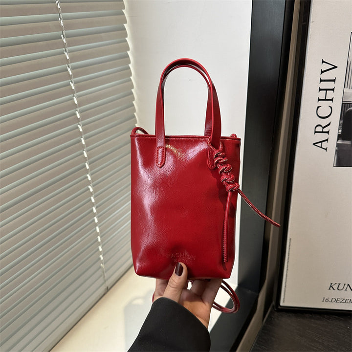 Damen Mini-Handtasche mit innovativem Kordelzug Nord Taschen
