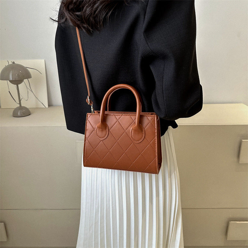 Damen stilvolle und strukturierte Handtasche mit trendiger Steppung Nord Taschen