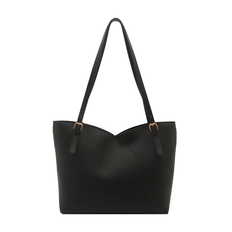 Damen elegante Handtasche mit asymmetrischem Design und robusten Trageriemen Nord Taschen