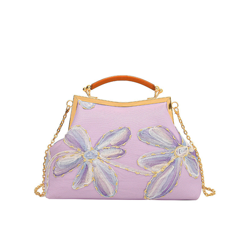 Damen Handtasche mit floralem Muster und elegantem Kettenakkzent Nord Taschen