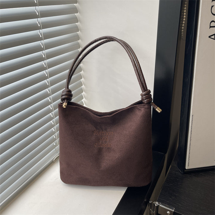 Damen elegante Wildleder-Handtasche mit modischen Akzenten Nord Taschen