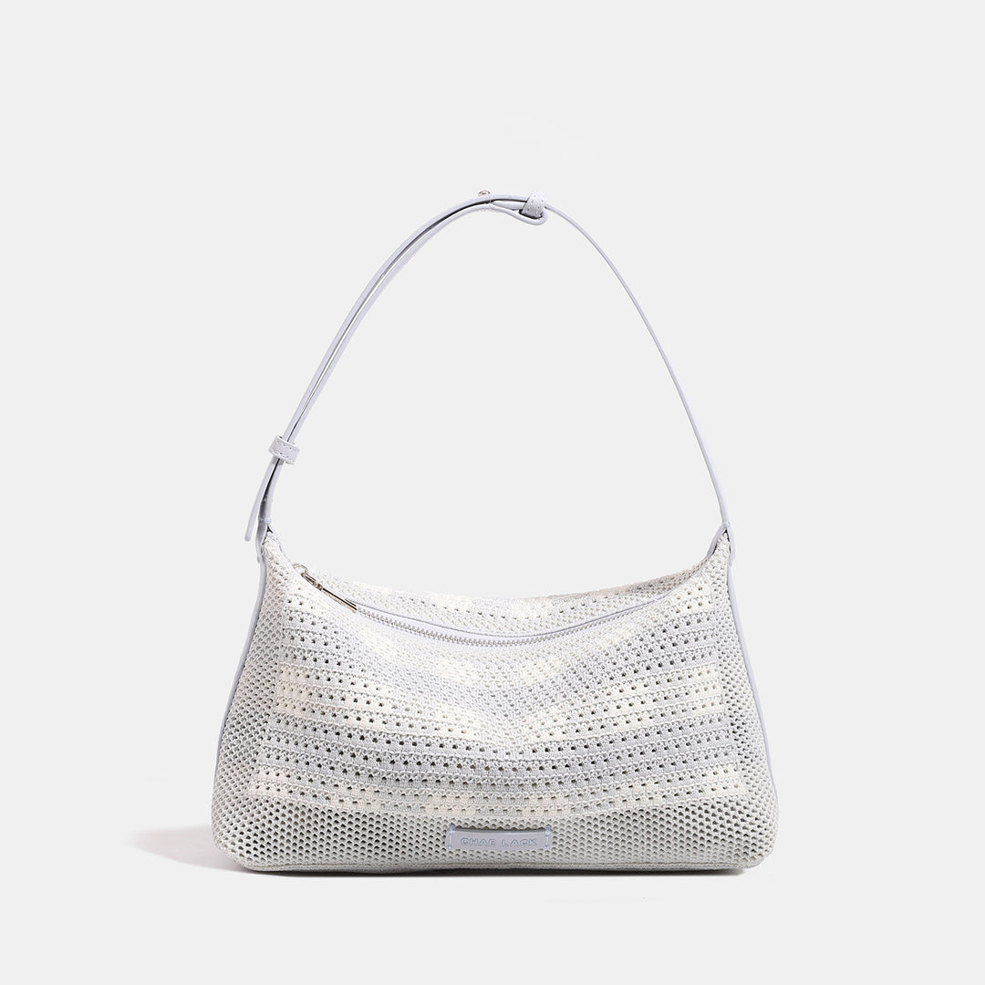 Damen Hobo-Tasche aus handgewebtem Material mit eleganten Lederakzenten Nord Taschen