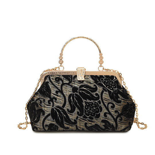 Damen stilvolle Handtasche mit floralem Design und goldfarbenen Akzenten Nord Taschen