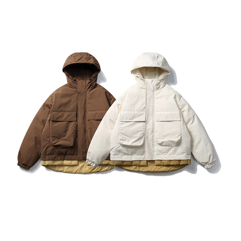 Unisex Kurz geschnittene wattierte Kapuzenjacke im Materialmix mit aufgesetzten Taschen Nord Taschen