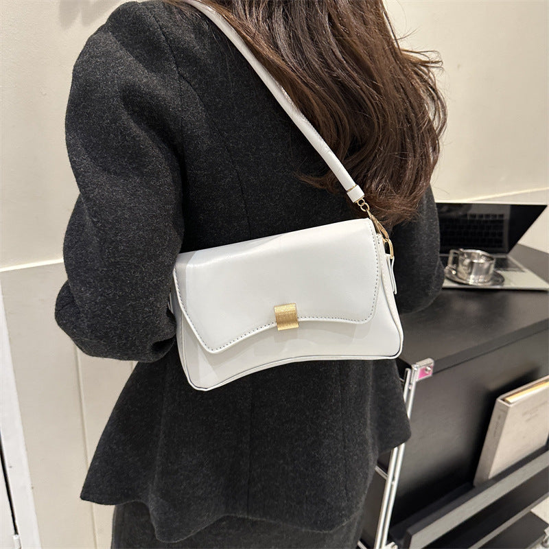 Damen elegante Umhängetasche mit goldener Verschlussmechanik Nord Taschen