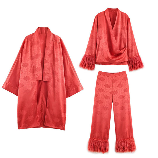 Damen hochtaillierte Satinhose mit Jacquard‑Blütenmuster und Federfransen Nord Taschen