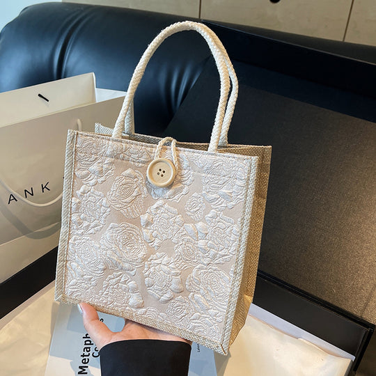 Damen Jute-Umhängetasche mit floralem Design und praktischem Buttonverschluss Nord Taschen