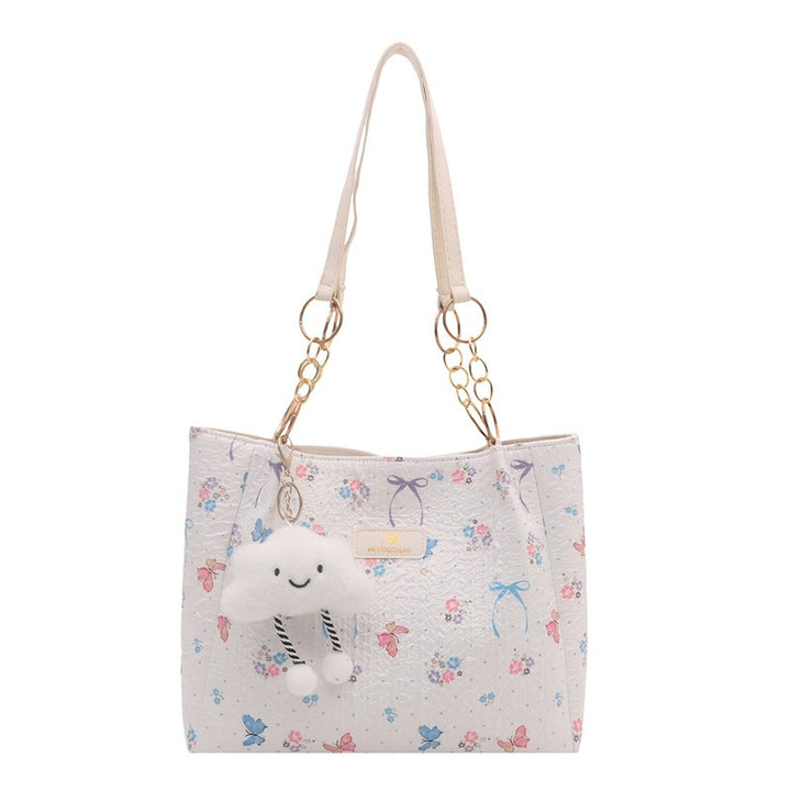 Damen Beuteltasche mit floralem Muster und verspieltem Anhänger Nord Taschen