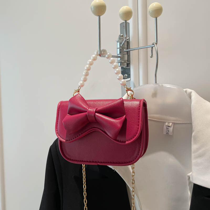 Damen Handtasche mit elegantem Schleifendetail und Perlenhenkel Nord Taschen