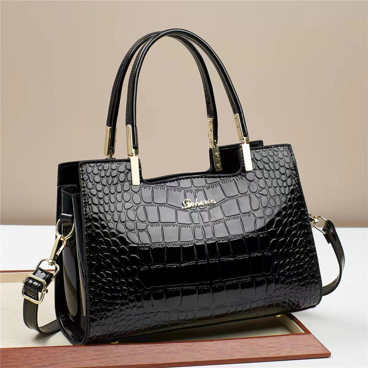 Damen Handtasche mit glänzender Krokodilprägung und abnehmbarem Tragegurt Nord Taschen