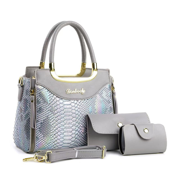 Damen stilvolle Handtasche mit Schlangenleder-Optik und abnehmbaren Accessoires Nord Taschen