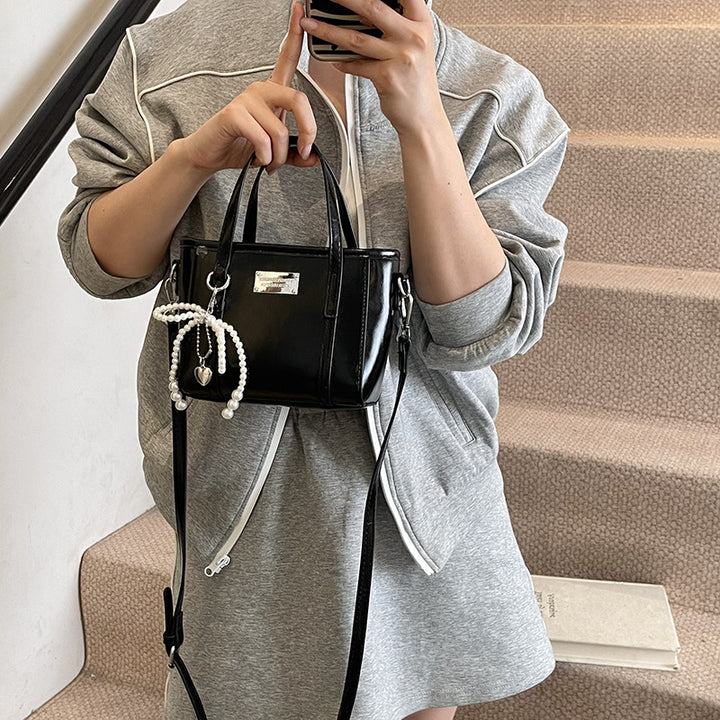 Damen Mini-Handtasche mit perlbesetztem Anhänger Nord Taschen