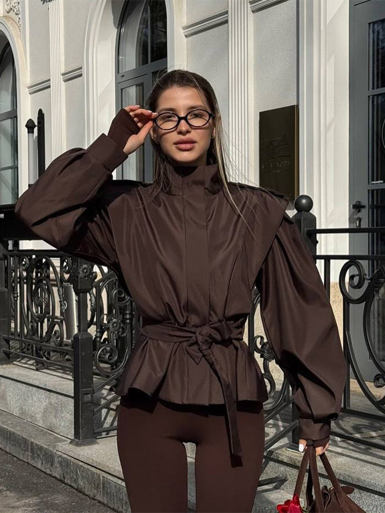Damen Taillierte Peplumjacke mit Bindegürtel und voluminösen Ärmeln Nord Taschen