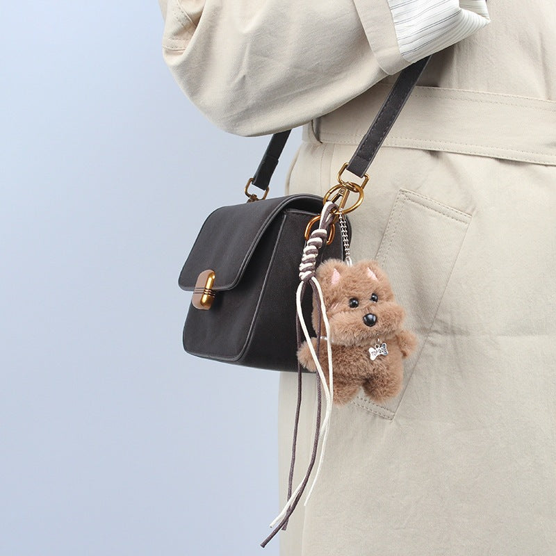Damen Elegante Umhängetasche mit dekorativem Anhänger Nord Taschen