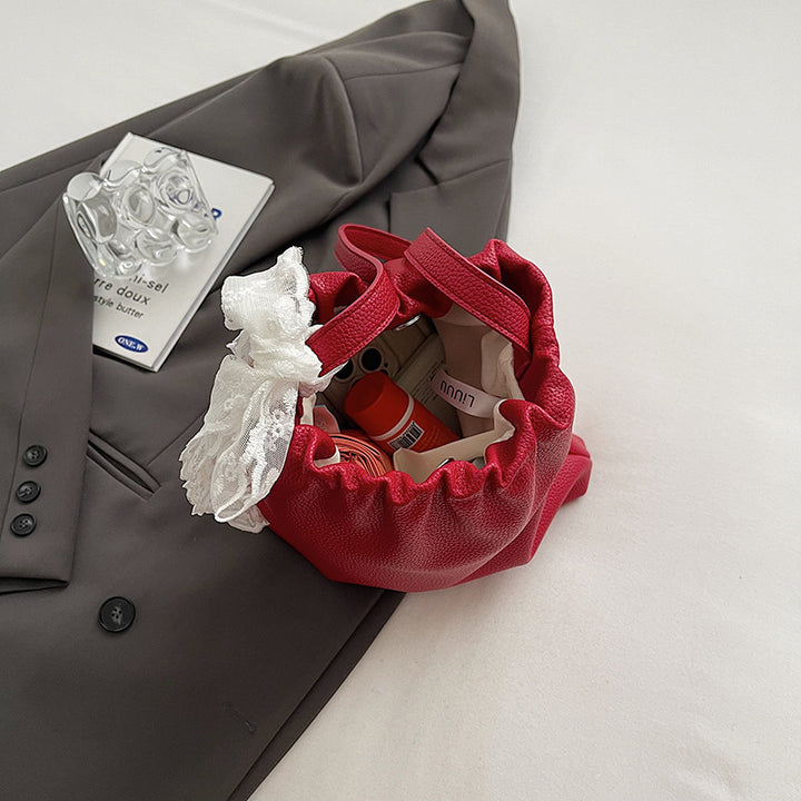 Damen modische Beuteltasche mit verspieltem Spitzenanhänger Nord Taschen