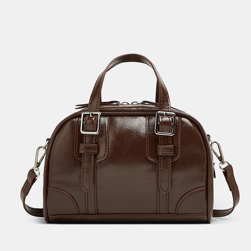 Damen Handtasche mit verstellbarem Schulterriemen und elegantem Hochglanzfinish Nord Taschen