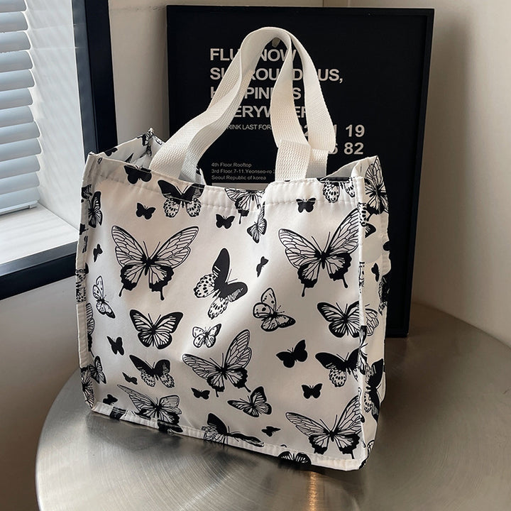 Damen Einkaufstasche mit floralem Schmetterlingsdesign und stabilen Tragegriffen Nord Taschen