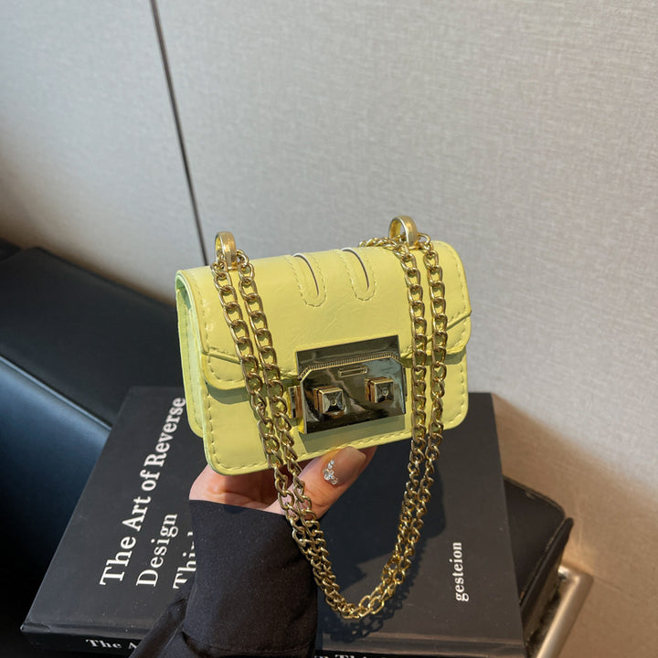 Damen elegante Mini-Handtasche mit goldener Verschlussmechanik Nord Taschen