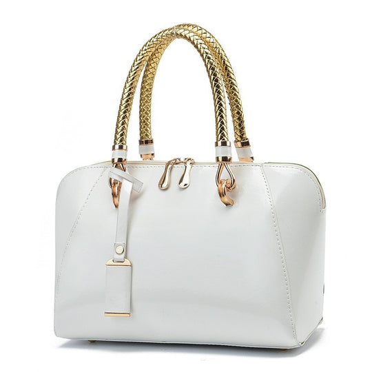Damen Handtasche mit eleganter Hochglanz-Oberfläche und geflochtenem Griff Nord Taschen
