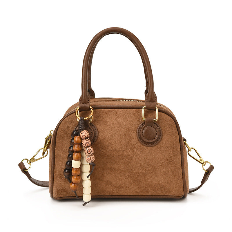 Damen Mini-Handtasche mit verspieltem Anhänger Nord Taschen