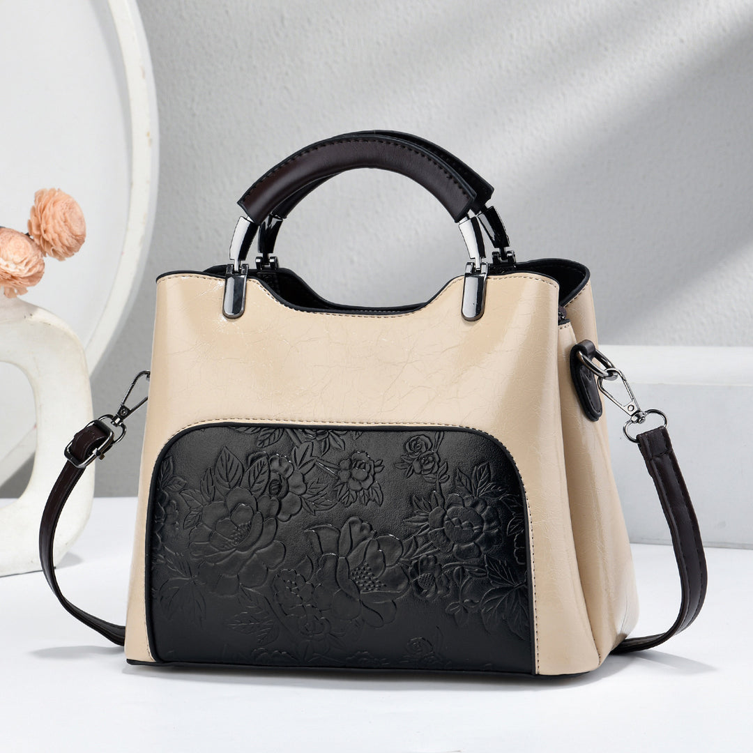 Damen elegante Handtasche mit floralem Relief Nord Taschen