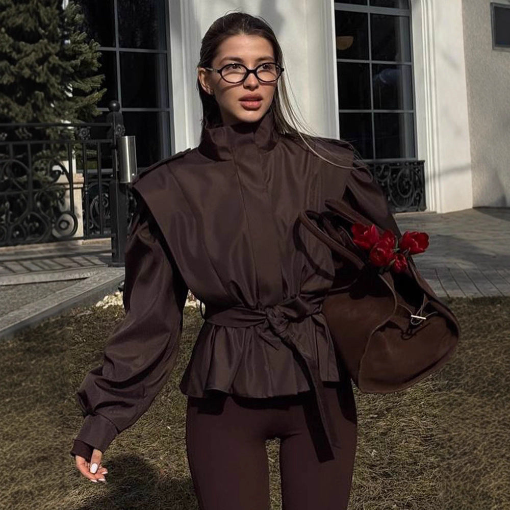 Damen Taillierte Peplumjacke mit Bindegürtel und voluminösen Ärmeln Nord Taschen
