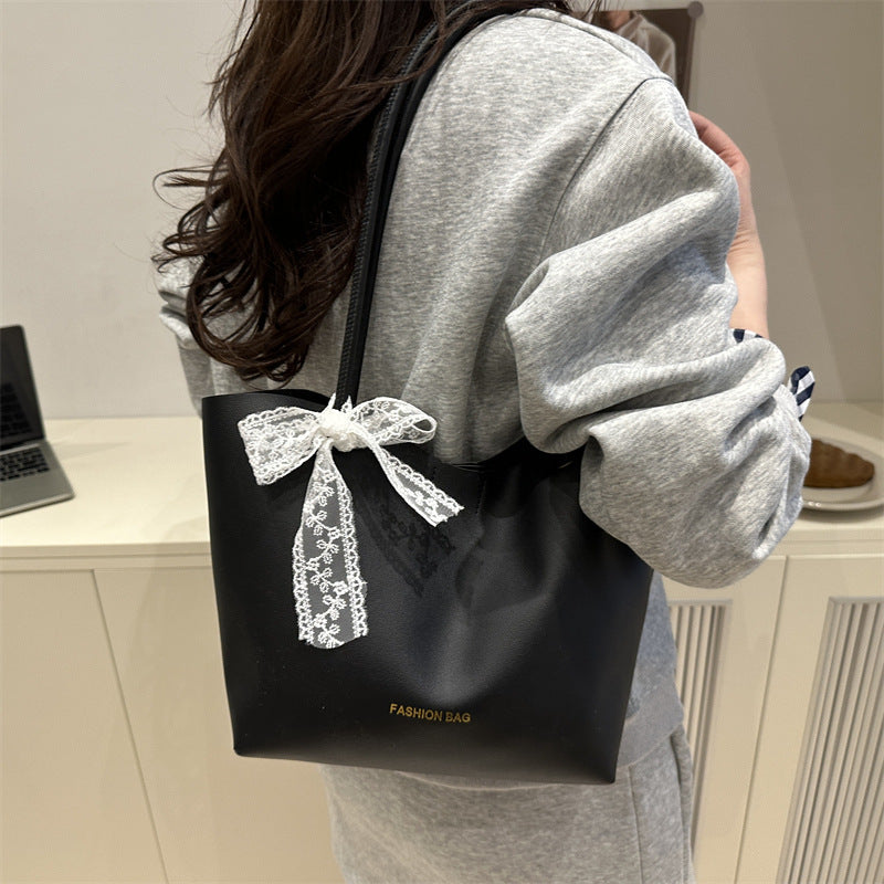 Damen Tote-Tasche aus hochwertigem Kunstleder mit verspieltem Schleifendetail Nord Taschen