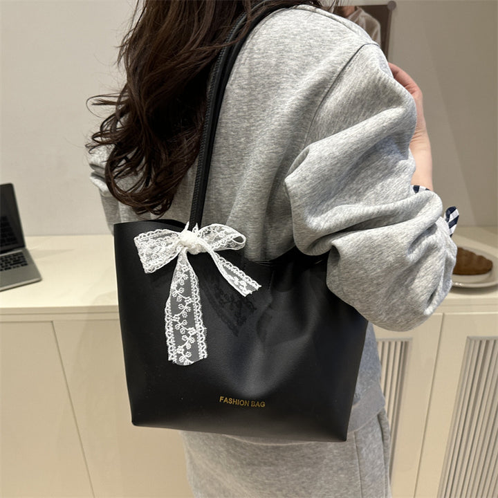 Damen Tote-Tasche aus hochwertigem Kunstleder mit verspieltem Schleifendetail Nord Taschen