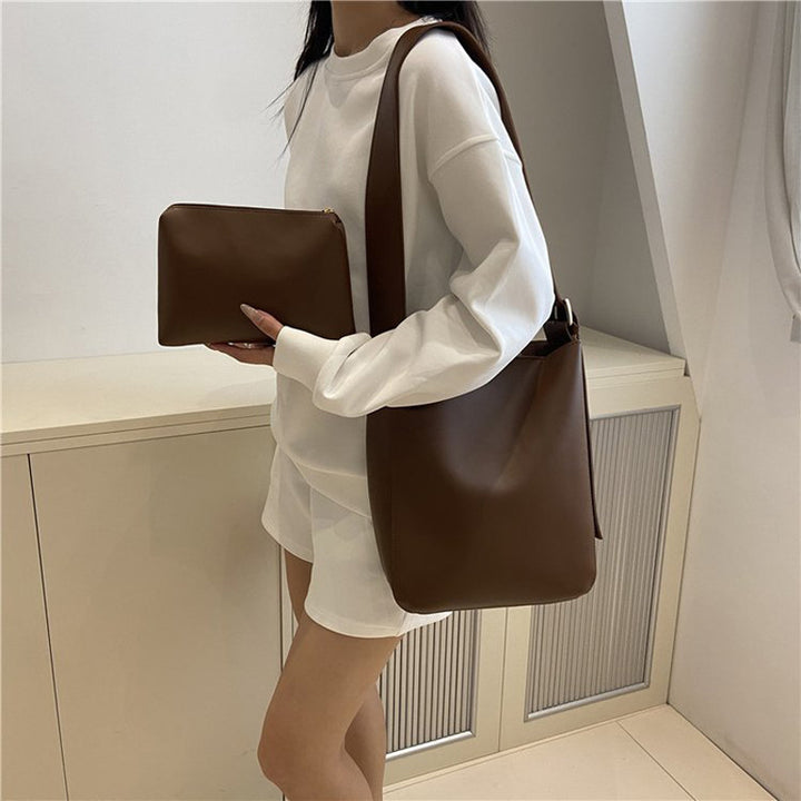 Damen Hobo-Tasche mit minimalistischer Form und luxuriöser Textur Nord Taschen
