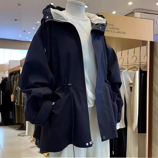 Damen Oversize-Kapuzenjacke mit Tunnelzug, Pattentaschen und Zwei-Wege-Reißverschluss Nord Taschen
