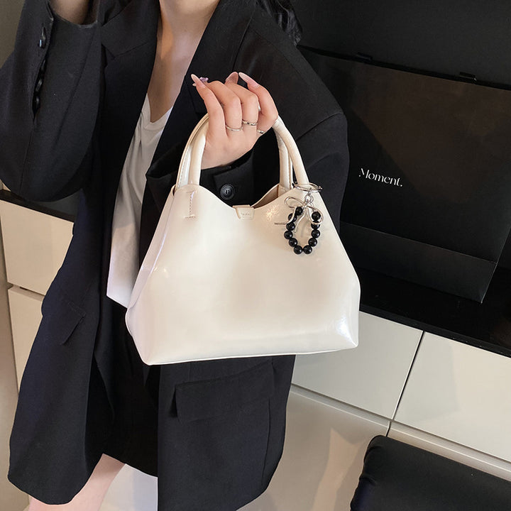 Damen elegante Handtasche mit hochwertiger Lackoberfläche Nord Taschen
