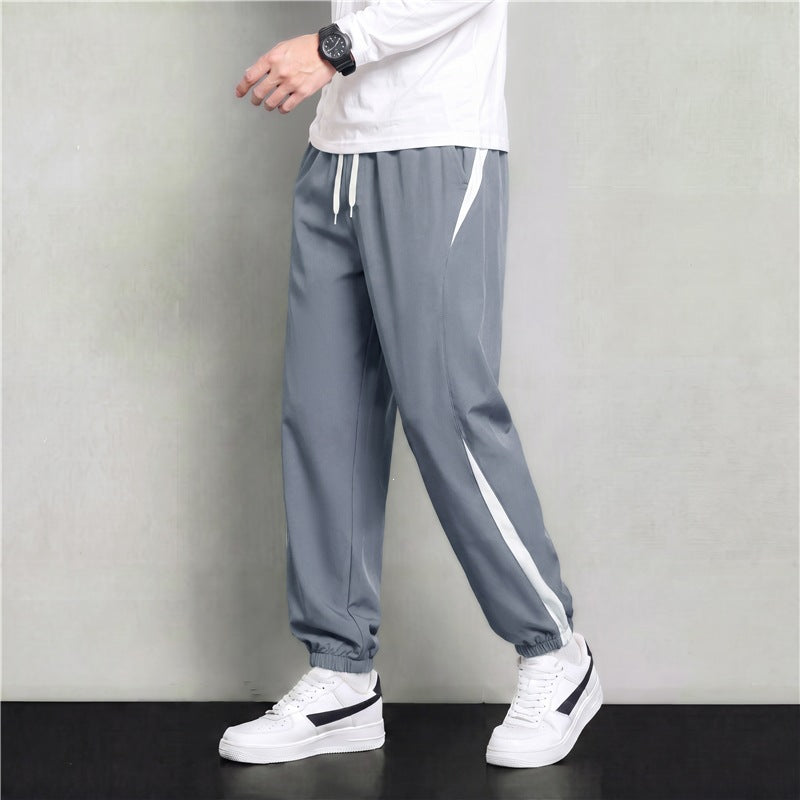 Herren Athleisure Jogginghose im Baggy‑Schnitt mit elastischem Bund, Tunnelzug und seitlichen Kontrastkeilen Nord Taschen