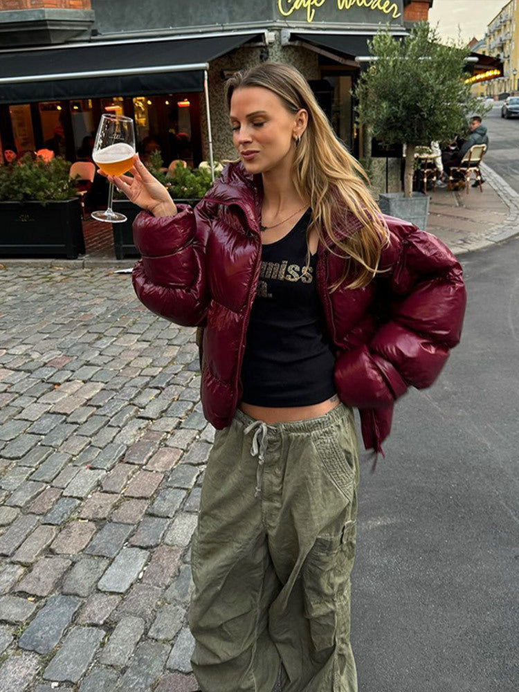 Damen Glänzende Oversize-Steppjacke mit Kapuze und hohem Stehkragen Nord Taschen